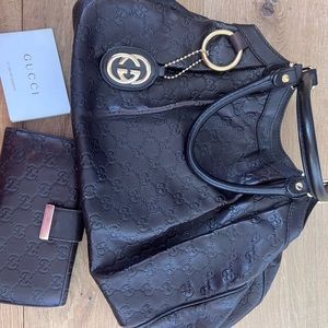 Gucci Brown Sukey Tote/Purse and Wallet both have authenticity ticket